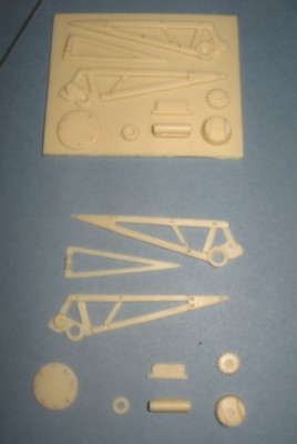 The anchor handling crane. The components of this are removed from their base with a fine fret saw blade.