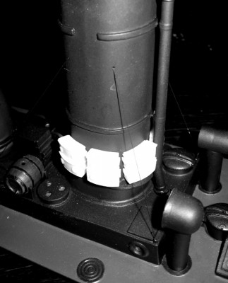 Sorry this is a B&amp;W picture. These are the cast resin life jacket storage lockers around the base of the funnel casing, prior to painting.