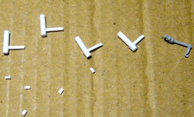 The start of the boat lifts. the small rectangular pieces got glued to the beam to depict the pulley and the hook from the kit part was then glued on that