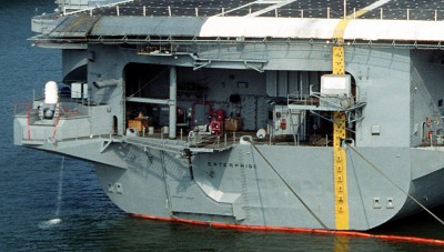 Close up view of the fantail on CVN-65 as she looked on August 14, 1990.  Note the hinge-down stern dock installed in 1982 and replaced in 1995 with the style seen below.  [Cropped USN photo by Don S. Montgomery]