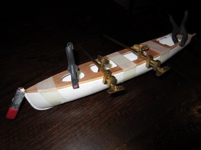 The deck edge timber was glued in place along the groove in the top of the hull moulding.