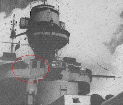 Here is a (bad) pic of the Ship in 1938: given the perspective of the photo, I'd espect the side of the bridge cabin as you built it should be visible (check the main turret side) instead we can only see the sky and the rear tree wiring in that location even between the two side range finders.