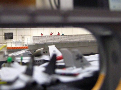 As in any situation in the military, while there are a bunch of guys on deck below busting their butts, there are guys up top watching them work and doing nothing productive.