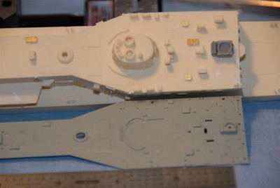 A side by side of YMW resin kit and the upper deck from the Academy FFG-7 kit.  You can see that the YMW's is about 1/4" too short.