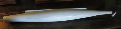 The basic turned hull plug. It has just been primed to seal the surface. The tail section has also been turned but I have yet to make the nose/bw piece.
