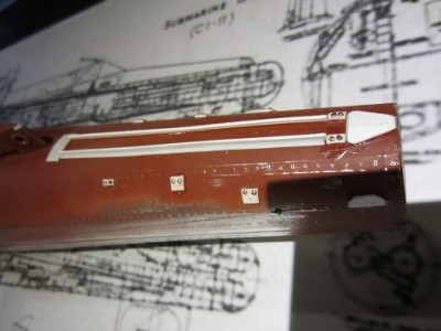 Here some of the surface detail has been added to the top forward section of the hull.