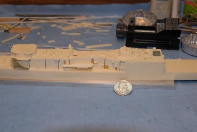 Adding small details, more hoods,  racks, fire mains, deck lights, upper-deck scuppers and down pipes.