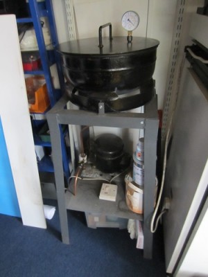 This is my home made vacuum chamber used for de gassing the silicon rubber. Made from an old propane cylinder and the pump from a domestic freezer.