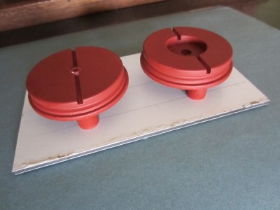 The two masters where then secured with screws to a plastic base.