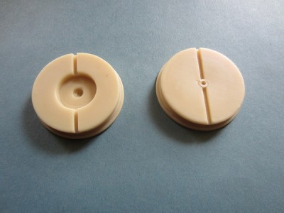 The two finished resin "end bungs".