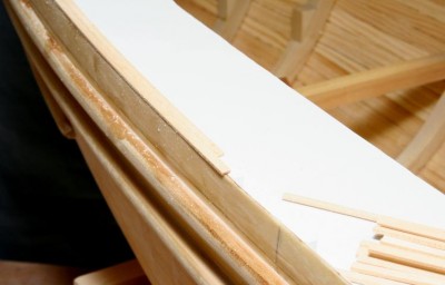 Building the cap rail, strip by strip (needed 40 feet of this 1/16" x 1/8" stock)