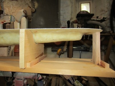 The cradle can be clamped to the bench when in use.