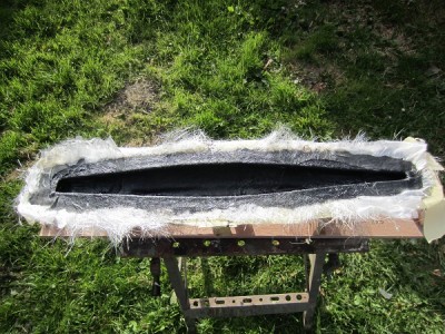 The hull being "laid up" in the mould.