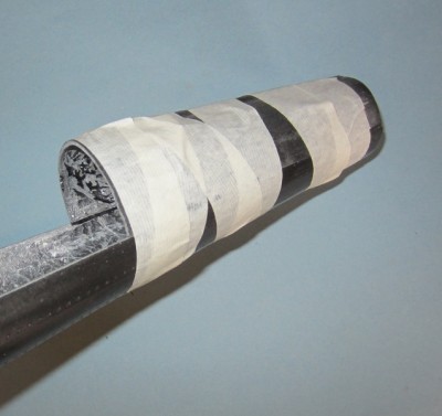 The upper bow section was held in place with tape before gluing.