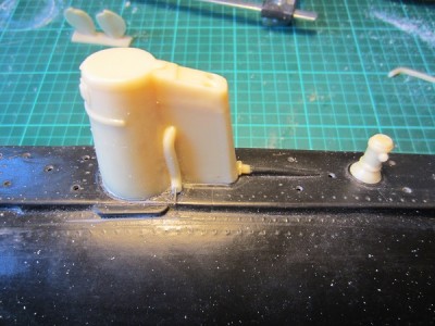 The conning tower casting was glued and screwed in place.