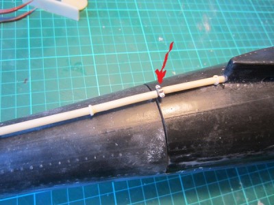 The exhaust pipe was also resin and the sections were fitted along with the support brackets (arrowed) made up from thin aluminium sheet.