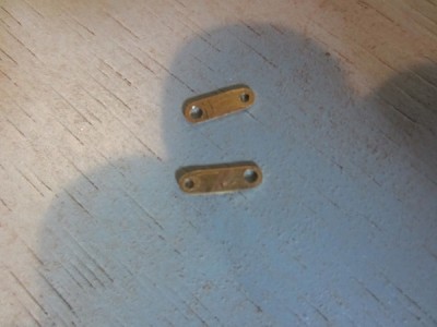 The brass activating arms for the diving plane mechanism.