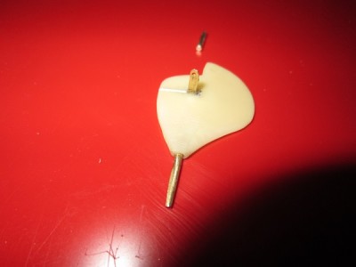 The styrene card "filler" has been trimmed. The outer brass pin is ready to be inserted to complete the hinge mechanism.