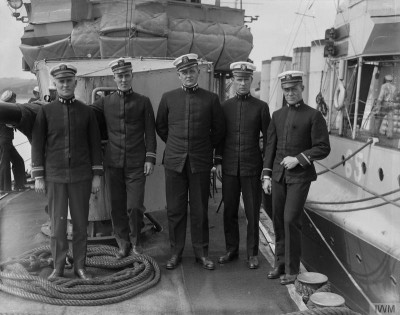 Officers along side Davis DD65