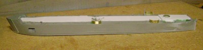 I guess I'm kinda picky, but I didn't like the thickness of the kit's gun tubs.  They scale out to almost 6 inches thick, whereas the actual shields were .25 inch thick.  I installed gun tubs of brass .005 inch sheet, attached with CA.