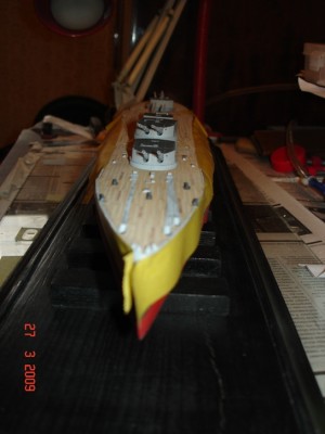 the sides of the hull are covered by masking tape - not to hide my faults (which are existing thought) but to save the casemates and guns from damage (and fillers dust) which can result at the stage of assembling everything