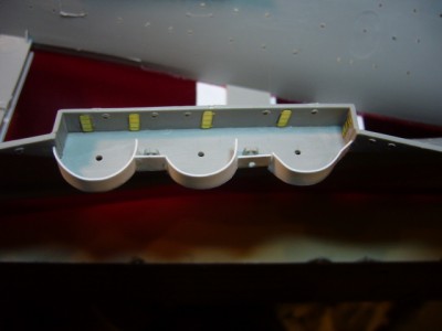 Here it is glued in place and you can see where the center shield is now cut back to where it should be.